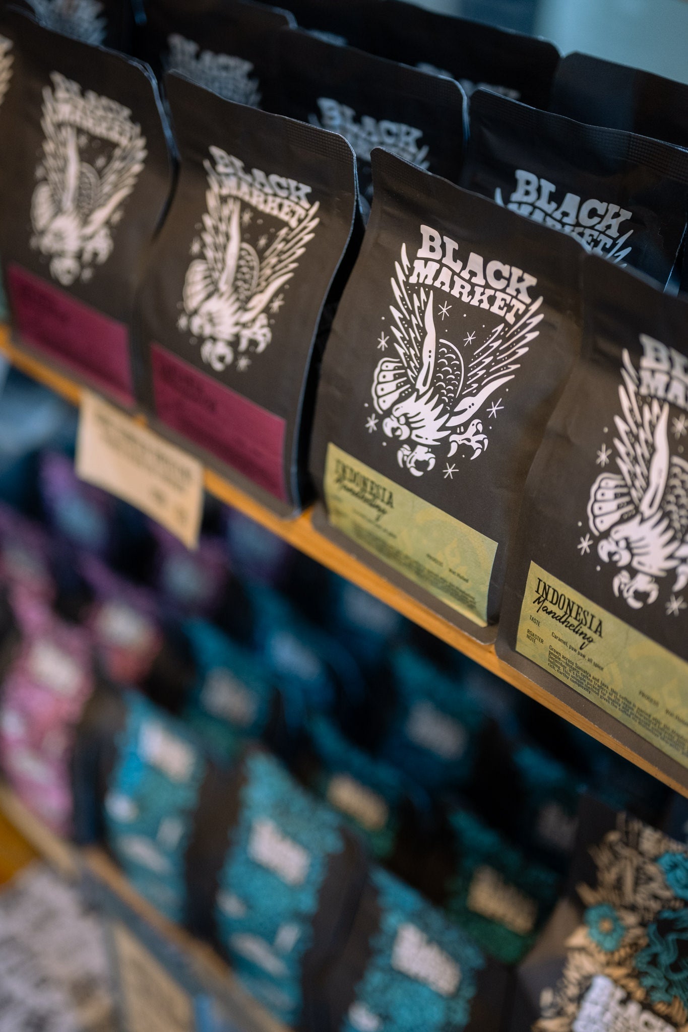Barista preparing espresso at Black Market Training roastery studio